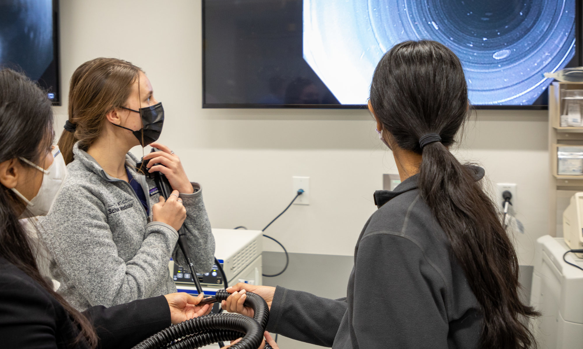 Sujata Ojha and Mallory Thompson use the latest laparoscopic surgery equipment at the TCU School of Medicine on February 2022.