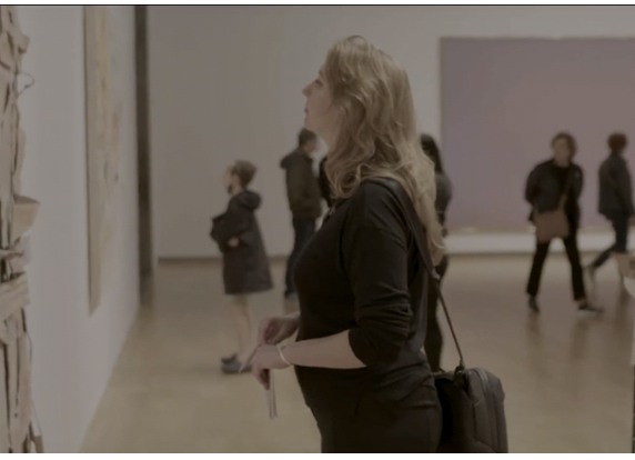 Chase Crossno, MPH, Assistant Artistic Director at the TCU School of Medicine, studies artwork at the Modern Art Museum in Fort Worth.