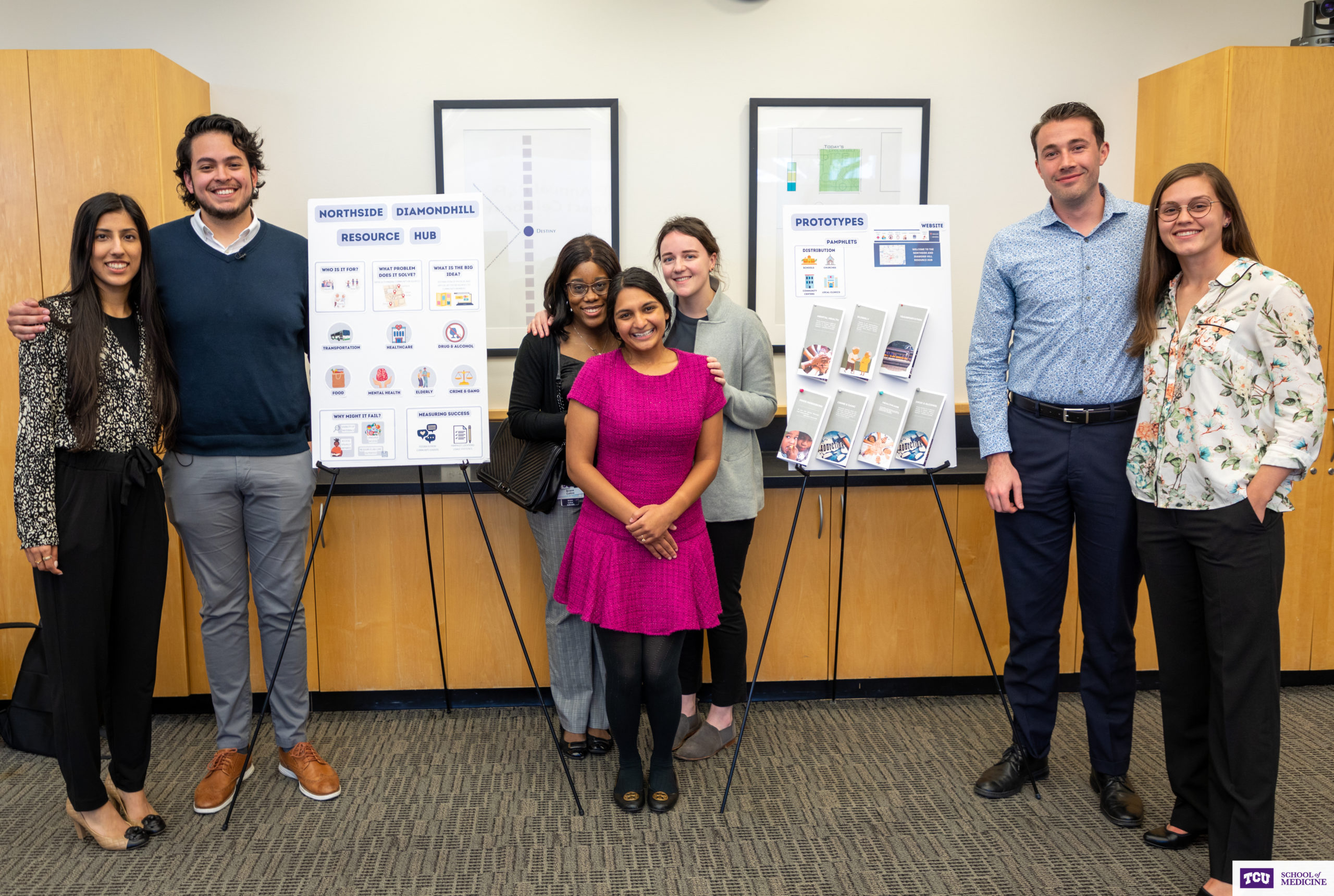 : TCU School of Medicine THRIVE Learning community members of Honris and Empatheia houses present their poster for the Northside/Diamond Hill community at the first annual P4P: Community Impact Project Celebration. The members pictured above are (from left to right): Sarah Cheema, Edmundo Esparza, Briana Collins, Juhi Shah, Sarah Lyon, Thomas Roser and Quinn Losefsky.
