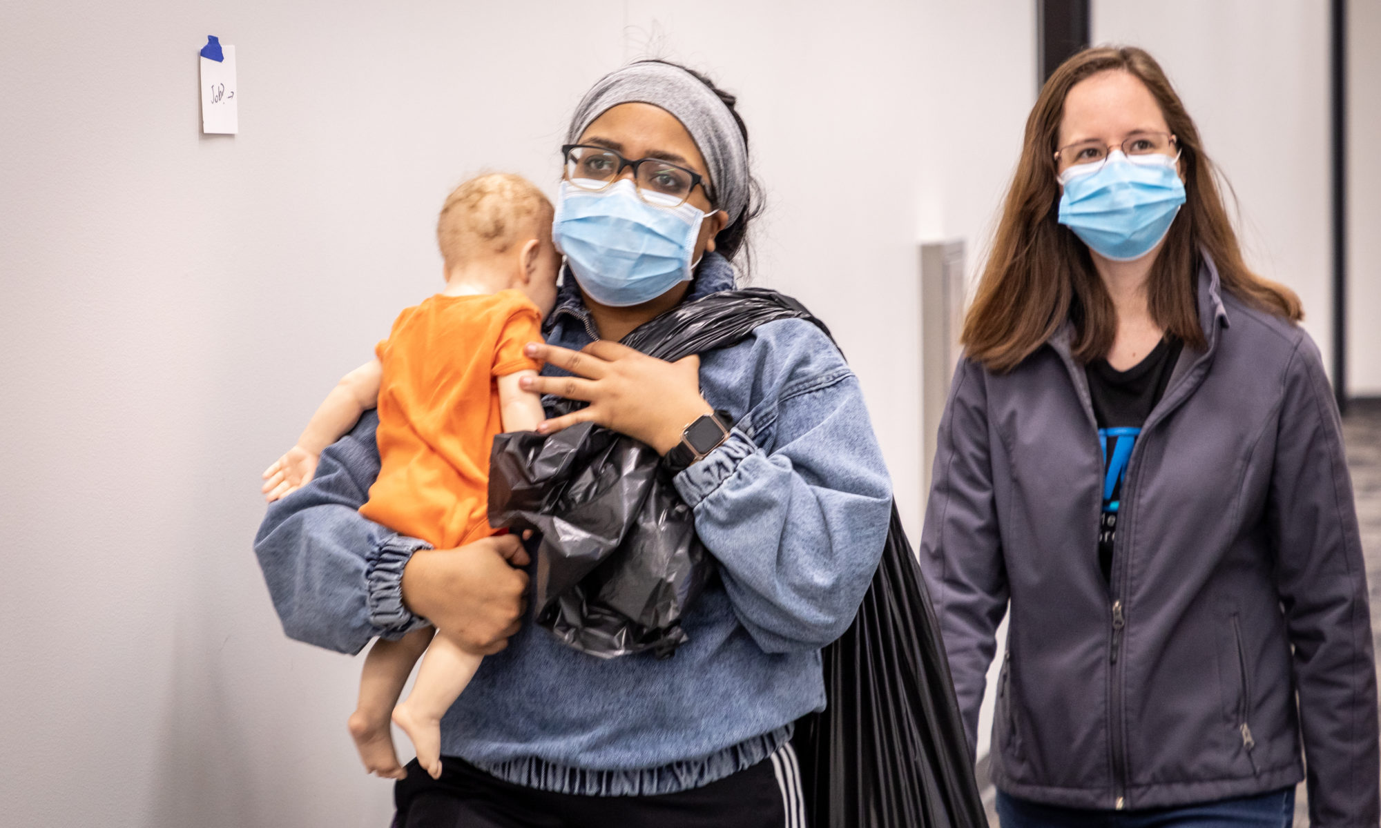 Medical students Charna Kinard, left, and Mei Mei Edwards, both CO2024, followed a hypothetical case study of a 24-year-old Ukrainian woman who answered an ad to be a pen pal with an American man during their course on domestic violence at the Burnett School of Medicine at TCU.