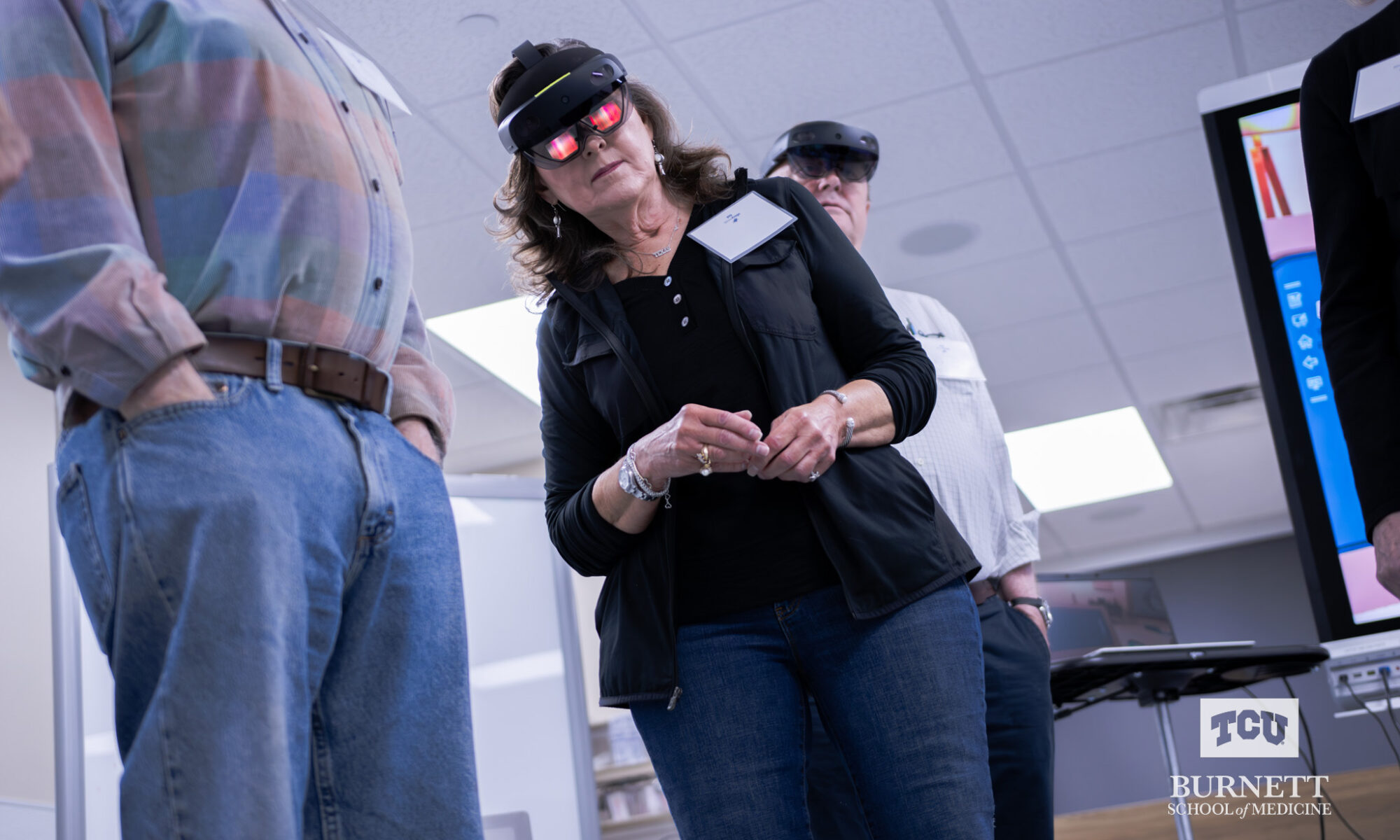 TCU Silver Frogs tried on the Microsoft HoloLens® and  learned about the Anne Burnett Marion School of Medicine at Texas Christian University's HoloAnatomy® curriculum.