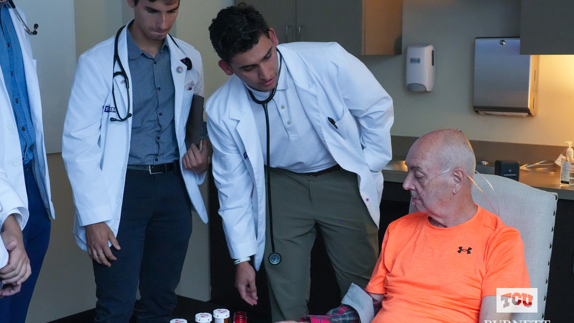 Nico Martinez, MS-1, speaks to a Standardized Patient during the Geriatric Escape Room exercise at the Anne Burnett Marion School of Medicine at Texas Christian University in Fort Worth, Texas.