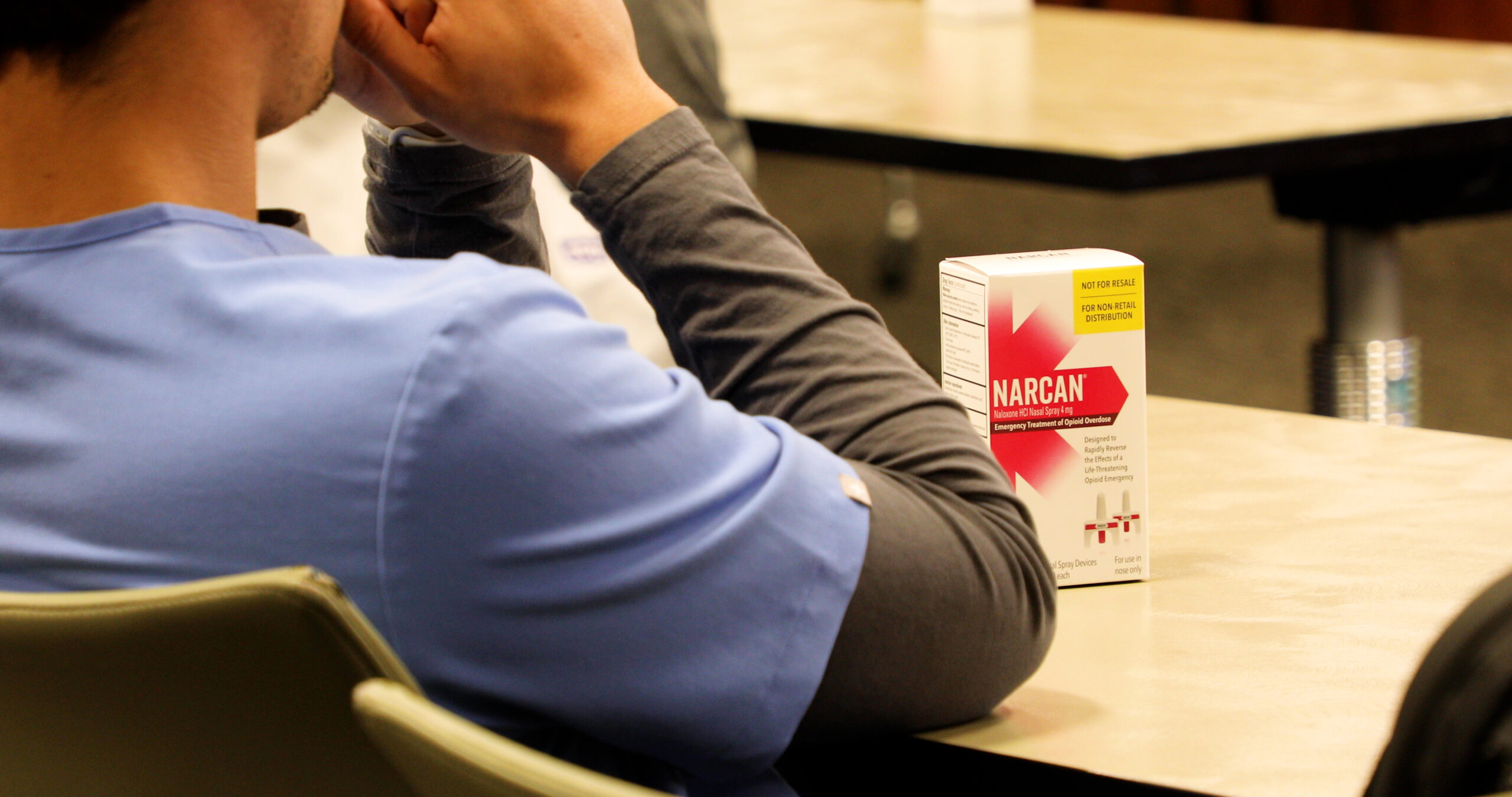 Student with Narcan on desk — Burnett School of Medicine at TCU