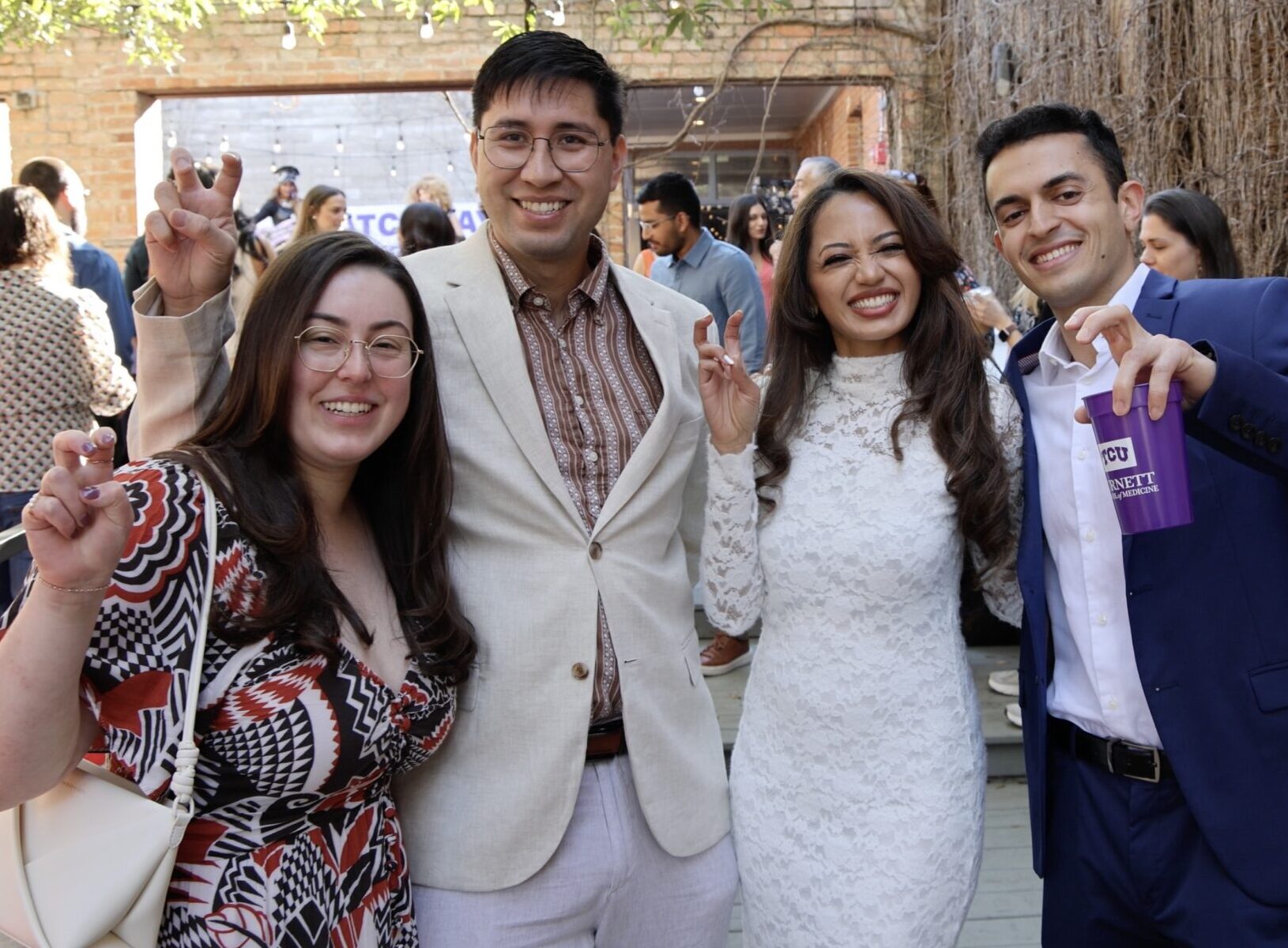 L-R: Amanda Block, Andrea Goh, Bhavana Sreepad and Amir Akhavan at the Burnett School of Medicine at TCU 2026 Match Day event.